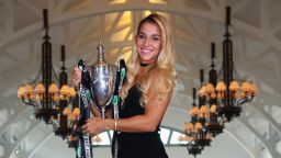 SINGAPORE - OCTOBER 31:  Champion Dominika Cibulkova of Slovakia poses with the Billie Jean King trophy after her victory against Angelique Kerber of Germany at Clifford Pier on October 31, 2016 in Singapore.  (Photo by Clive Brunskill/Getty Images)