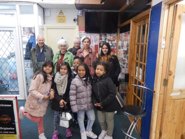 Campaigners from the Ward's Corner Community Coalition, which is fighting to save the market from developers, with children of market traders.  