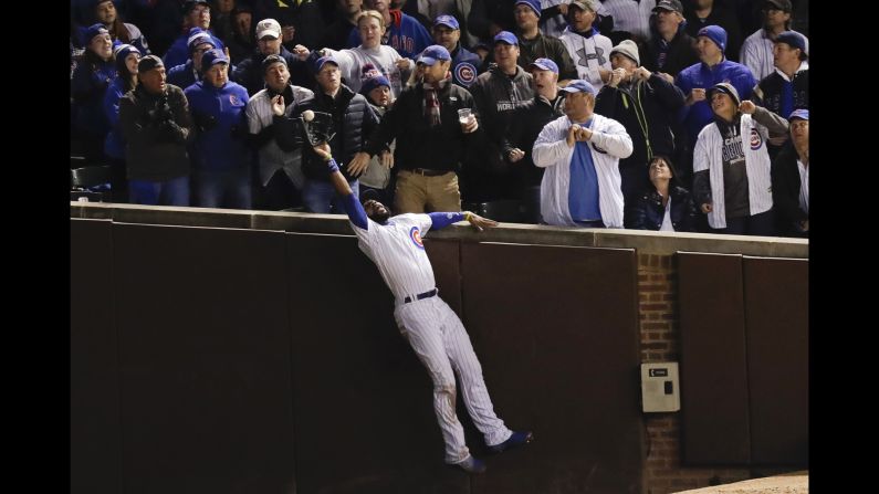 Chicago Cubs right fielder Jason Heyward catches a fly ball during Game 5 of the World Series on Sunday, October 30. The Cubs <a href="index.php?page=&url=http%3A%2F%2Fwww.cnn.com%2F2016%2F10%2F30%2Fsport%2Fworld-series-game-5-cleveland-indians-chicago-cubs%2F" target="_blank">won the game</a> but still trail the Cleveland Indians 3-2 in the best-of-seven series.