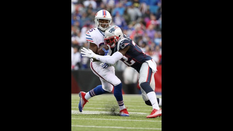 New England's Devin McCourty hits Buffalo's Brandon Tate during an NFL game in Orchard Park, New York, on Sunday, October 30. Tate left the game after the hit.