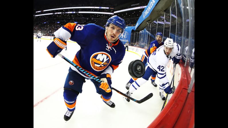 Casey Cizikas, a forward with the New York Islanders, watches the puck during an NHL game against Toronto on Sunday, October 30.