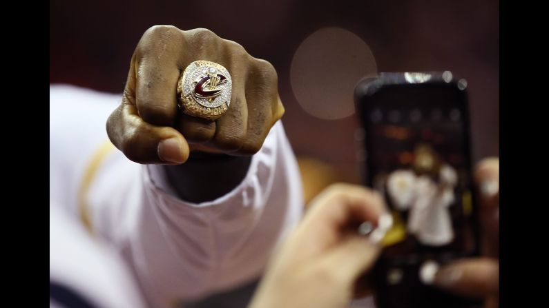 LeBron James shows off the championship ring that he and the rest of the Cleveland Cavaliers received on Tuesday, October 25.