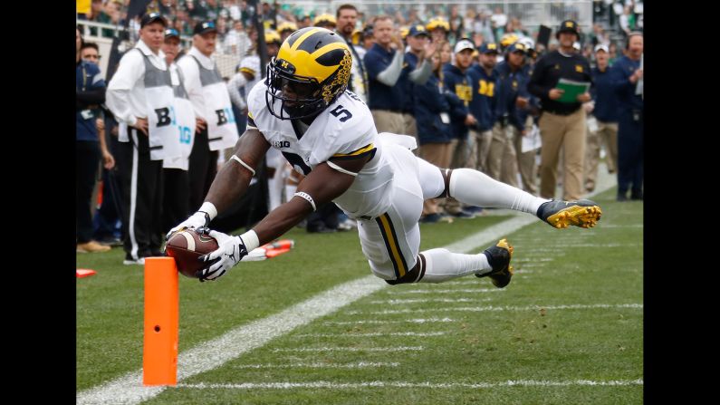 Michigan's Jabrill Peppers dives for a touchdown at Michigan State on Saturday, October 29. Peppers <a href="index.php?page=&url=http%3A%2F%2Fwww.freep.com%2Fstory%2Fsports%2Fcollege%2Funiversity-michigan%2Fwolverines%2F2016%2F10%2F30%2Fmichigan-jabrill-peppers%2F93006116%2F" target="_blank" target="_blank">played at least 10 different positions</a> during the rivalry game, which Michigan won 32-23.