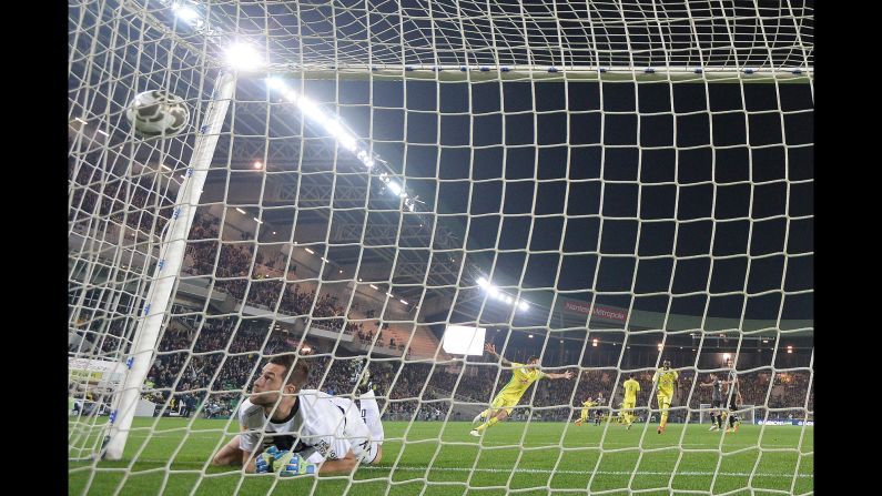 Angers goalkeeper Denis Petric can't stop a shot from Nantes' Adrien Thomasson during a League Cup match in Nantes, France, on Tuesday, October 25. Nantes won 2-1.