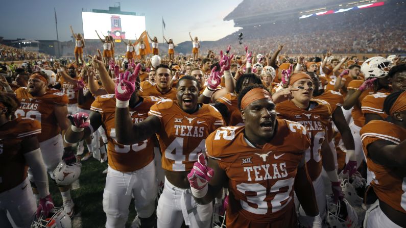Texas football players celebrate after their 35-34 home win against Baylor on Saturday, October 29. It was Baylor's first loss of the season.