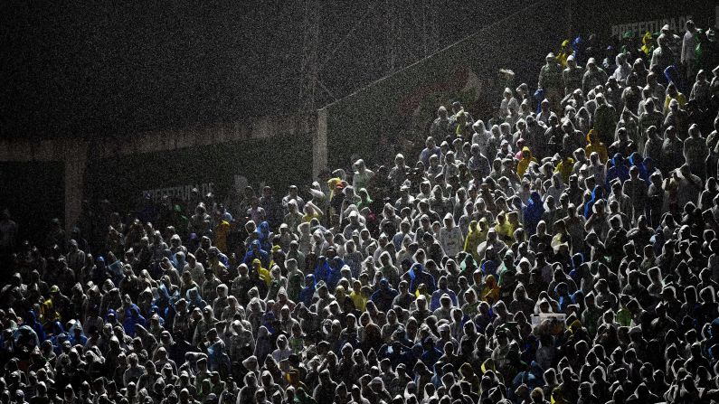 Supporters of the Brazilian soccer club Chapecoense cheer for their team during a Copa Sudamericana match in Chapeco, Brazil, on Wednesday, October 26. <a href="index.php?page=&url=http%3A%2F%2Fwww.cnn.com%2F2016%2F10%2F25%2Fsport%2Fgallery%2Fwhat-a-shot-sports-1025%2Findex.html" target="_blank">See 34 amazing sports photos from last week</a>