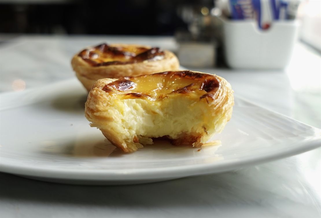 Batches of Lord Stow's Bakery egg tarts are freshly baked and available for take-out.