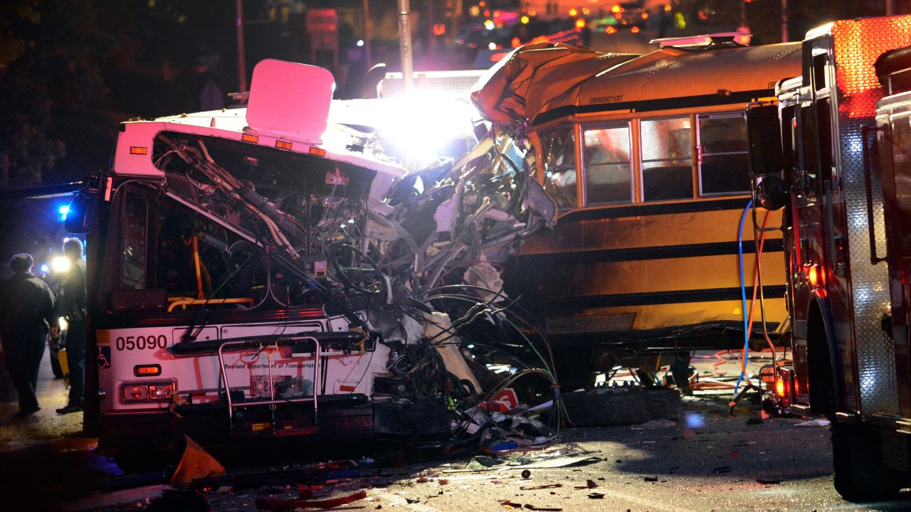 Fire department and rescue officials at the scene of Tuesday's fatal bus collision.