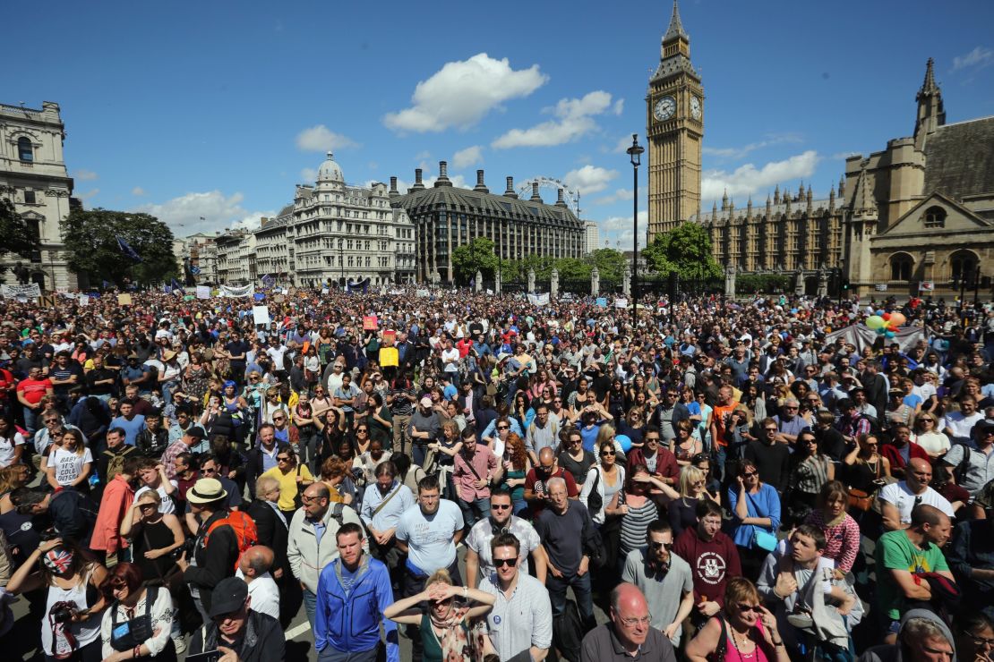 Crowds gather in Parliament Square to protest the result of the UK referendum last summer in London. 