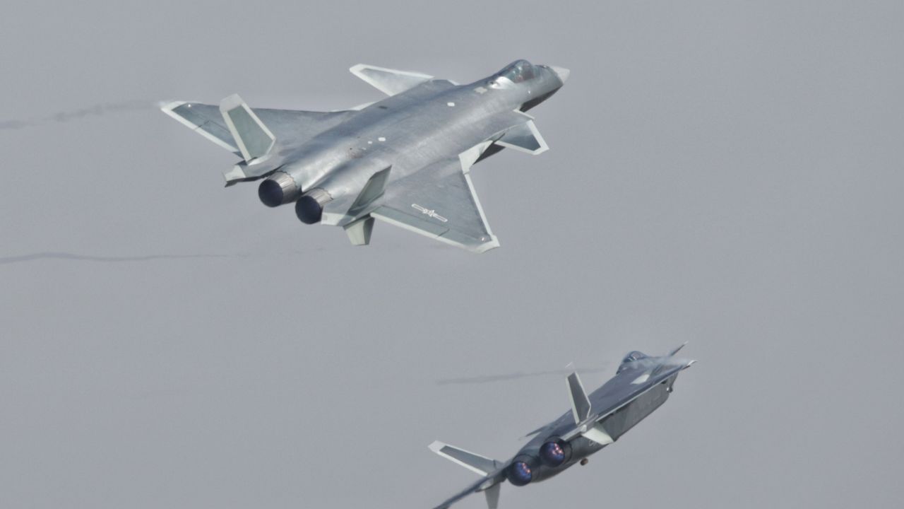 J-20 stealth fighters of the Bayi Aerobatic Team of PLA's (Peoples Liberation Army) Air Force perform during the 11th China International Aviation and Aerospace Exhibition, also known as Airshow China 2016, in Zhuhai city, south China's Guangdong province, 1 November 2016.

China's newest warplane, the J-20 stealth fighter, made its first public flight at Zhuhai Air Show, which opened on Tuesday (1 November 2016), its manufacturer announced. The J-20, "which military enthusiasts at home and abroad have watched closely," will make its first public flight demonstration, said Tan Ruisong, president of China's state aerospace company AVIC. China trailed the world in aerospace technology 20 years ago, he said, but was now at the leading edge. China's only international aerospace exhibition, held biennially in the southern city of Zhuhai, this year boasts its largest display of military hardware and aircraft, with 11 exhibition halls, 430,000 square meters of indoor and outdoor viewing area, and 151 aircraft from 700 exhibitors from 42 countries and regions.