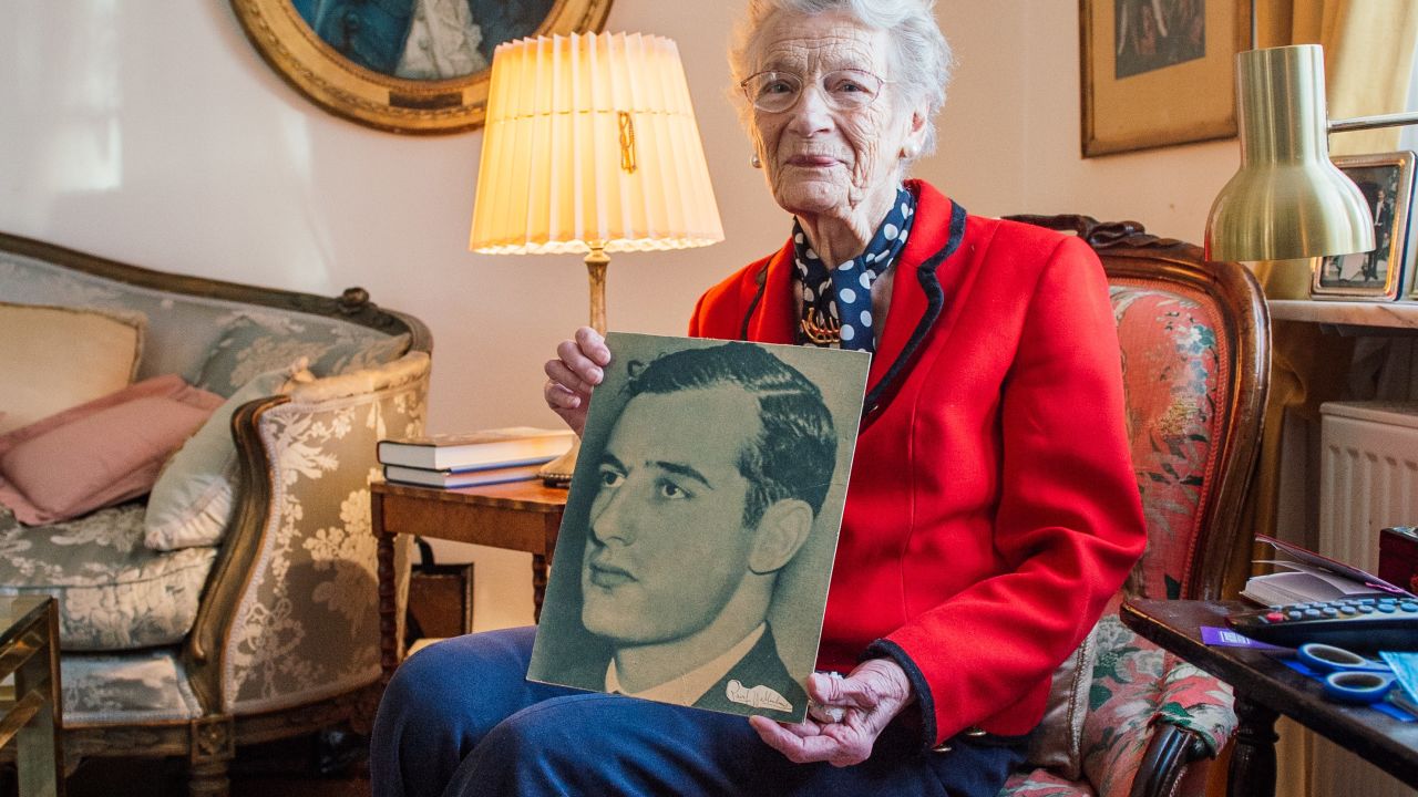 Nina Lagergren,  half-sister of Raoul Wallenberg, holds a picture of her brother in 2015.