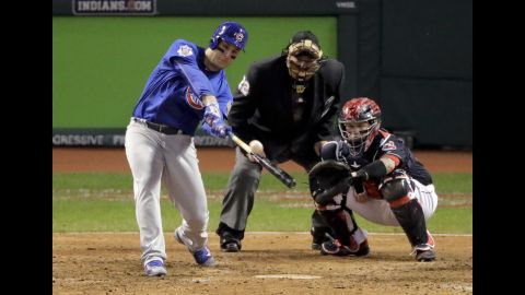 Anthony Rizzo of the Cubs hits two-run homer during the ninth inning of Game 6.