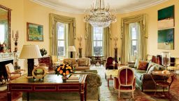 The image provided by Architectural Digest shows the Yellow Oval Room in the White House in Washington in a cover story about . Designer Michael S. Smith specified a Donald Kaufman paint for the Yellow Oval Room. Artworks by Paul Cézanne and Daniel Garber flank the mantel. Smith mellowed the Yellow Oval Room with smoky browns, greens, golds, and blues. The 1978 Camp David peace accords were signed at the antique Denis-Louis Ancellet desk, front left. President Barack Obama likes to say the White House is the "people's house." Architectural Digest photos are giving the public its first glimpse of private areas on the second floor of the White House that Obama, his wife, Michelle, daughters Malia and Sasha and family dogs Bo and Sunny have called home for nearly eight years. (Michael Mundy/Architectural Digest via AP)