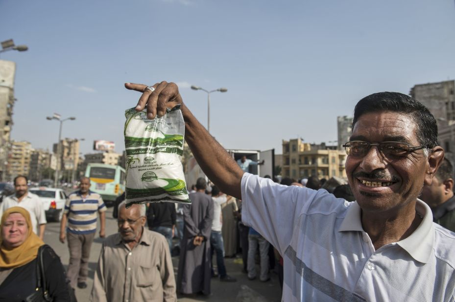 One of the lucky people able to buy sugar during the ongoing crisis that has swept the country. 