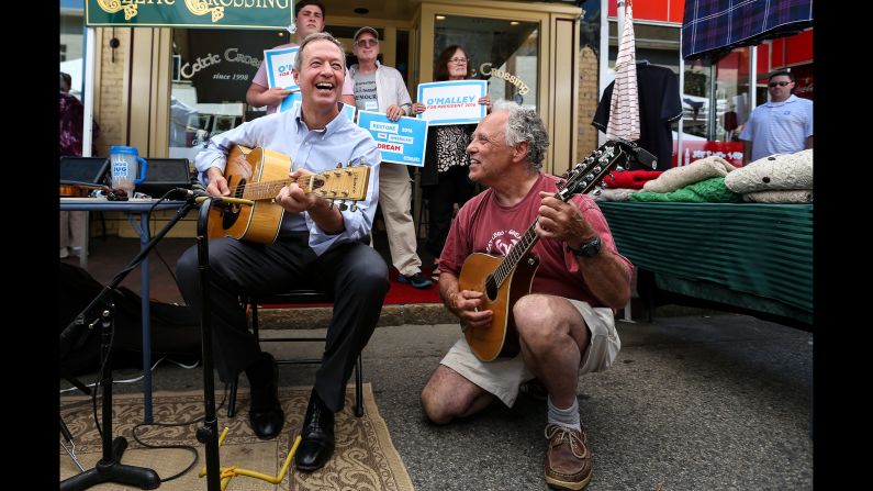 Democratic candidate Martin O'Malley, left, plays with a borrowed guitar during a meet-and-greet in Portsmouth, New Hampshire, on June 13, 2015. A couple weeks earlier, the former Maryland governor <a href="index.php?page=&url=http%3A%2F%2Fwww.cnn.com%2F2015%2F05%2F30%2Fpolitics%2Fmartin-omalley-2016-presidential-announcement%2F" target="_blank">launched his campaign</a> with an appeal to the party's progressive base, hoping to upend the conventional wisdom that Clinton was destined to clinch the Democratic nomination.