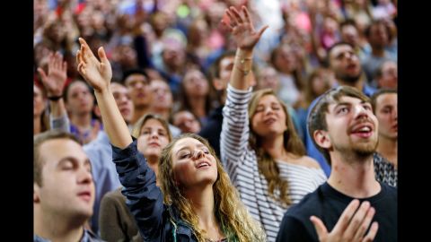 Liberty University students pray before a Sanders speech in Lynchburg, Virginia, on September 14, 2015. Sanders, who <a href="http://www.cnn.com/2016/09/28/politics/hillary-clinton-bernie-sanders-millenial-election-2016/" target="_blank">was popular with many young voters</a> during the Democratic primaries, <a href="http://www.cnn.com/2015/09/14/politics/bernie-sanders-liberty-university-speech/" target="_blank">staunchly defended abortion rights and same-sex marriage</a> during his visit to the largest Christian college in the world.