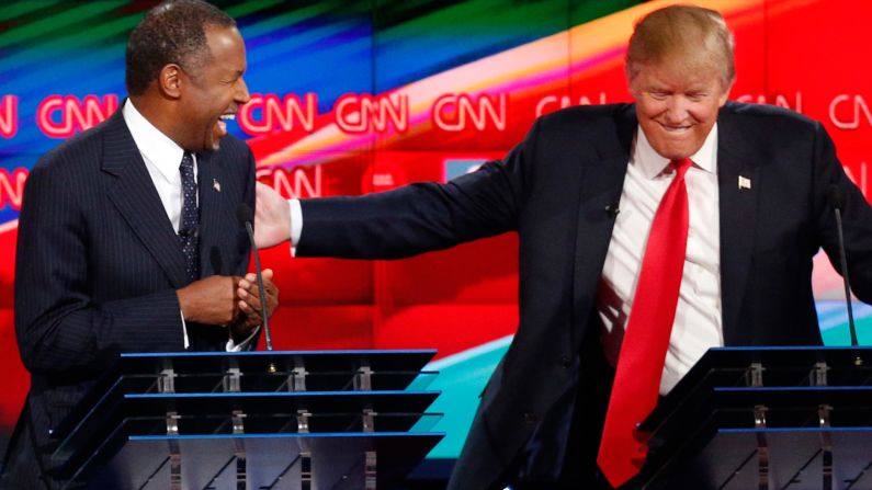 Trump shares a laugh with fellow candidate Ben Carson during <a href="index.php?page=&url=http%3A%2F%2Fwww.cnn.com%2F2015%2F12%2F15%2Fpolitics%2Fgallery%2Fgop-debates-las-vegas%2Findex.html" target="_blank">the Las Vegas debate.</a>