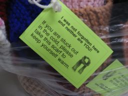 The scarves and mittens had encouraging notes attached to them.