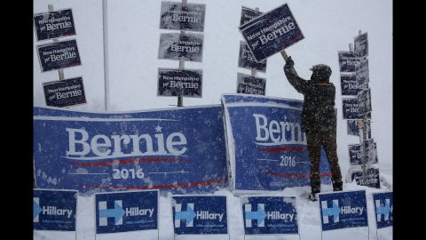 A campaign worker brushes snow off Sanders signs in Manchester, New Hampshire, on February 5, 2016. Sanders <a href="http://www.cnn.com/2016/02/09/politics/new-hampshire-primary-highlights/" target="_blank">won the New Hampshire primary</a> a few days later.