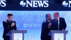 MANCHESTER, NH - FEBRUARY 06:  Republican presidential candidates New Jersey Governor Chris Christie (2nd R) and Donald Trump visit as Sen. Marco Rubio (R-FL) (L) stands close by during a commercial break in the Republican presidential debate at St. Anselm College February 6, 2016 in Manchester, New Hampshire. Sponsored by ABC News and the Independent Journal Review, this is the final televised debate before voters go to the polls for the New Hampshire primary on February 9.  (Photo by Joe Raedle/Getty Images)