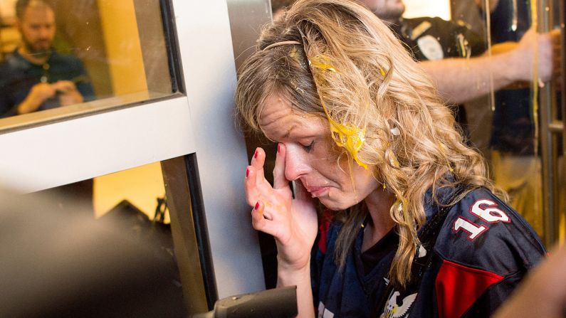 A Trump supporter wipes egg off her face after <a href="index.php?page=&url=http%3A%2F%2Fwww.cnn.com%2F2016%2F06%2F09%2Fpolitics%2Fdonald-trump-protests-eggs%2Findex.html" target="_blank">clashes broke out between Trump supporters and Trump protesters</a> in San Jose, California, on June 2, 2016. Trump was holding a rally at the nearby convention center.