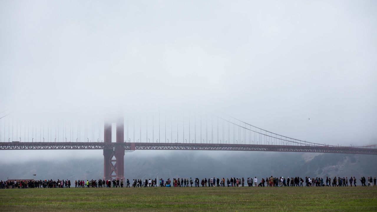 People wait in line to attend a Sanders rally in San Francisco on June 6, 2016.