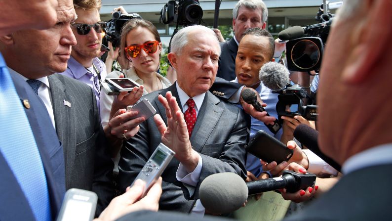 U.S. Sen. Jeff Sessions, center, talks with reporters after Trump met with the Senate Republican Conference on July 7, 2016. Trump had come to Capitol Hill with the hopes of unifying the party. Sessions, one of Trump's staunchest supporters, argued that Trump had accomplished his goals at the meeting by making a more strenuous effort to bring the party together. <a href="index.php?page=&url=http%3A%2F%2Fwww.cnn.com%2F2016%2F07%2F07%2Fpolitics%2Fdonald-trump-capitol-hill-republicans%2F" target="_blank">But there were reports of tension.</a>