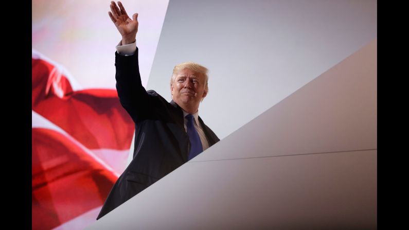 Trump waves as he leaves the stage during <a href="index.php?page=&url=http%3A%2F%2Fwww.cnn.com%2F2016%2F07%2F18%2Fpolitics%2Fgallery%2Fgop-convention%2Findex.html" target="_blank">the Republican National Convention</a> on July 18, 2016.