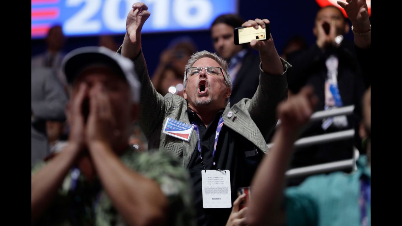 People react to Cruz's speech at the convention on July 20, 2016.