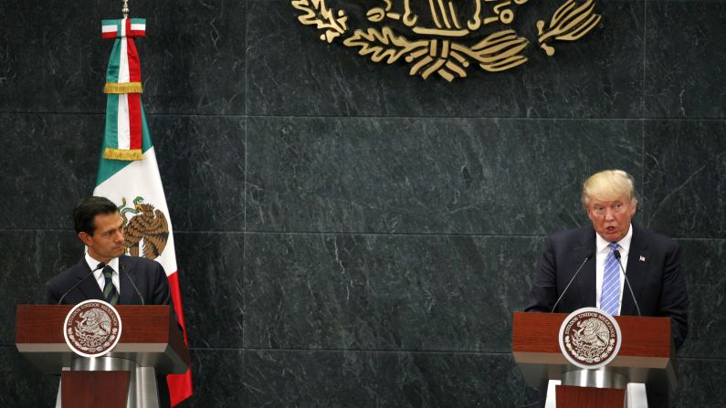 Trump and Mexican President Enrique Peña Nieto, left, attend a news conference in Mexico City on August 31, 2016. They discussed the wall that Trump vowed to build on the U.S.-Mexico border, but Trump said they didn't talk about his demand that Mexico pay for it -- <a href="index.php?page=&url=http%3A%2F%2Fwww.cnn.com%2F2016%2F08%2F30%2Fpolitics%2Fdonald-trump-enrique-pea-nieto-mexico%2Findex.html" target="_blank">an assertion the Mexican President later disputed.</a>