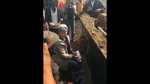 Jill Stein, the Green Party's presidential candidate, spray-paints a bulldozer <a href="http://www.cnn.com/2016/09/07/politics/jill-stein-pipeline-protest-trespassing-charges/index.html" target="_blank">during a protest against the Dakota Access Pipeline</a> in Morton County, North Dakota, on September 6, 2016. A North Dakota sheriff's office charged Stein and her running mate, Ajamu Baraka, with criminal trespass and criminal mischief. Stein, who has a history of environmental activism, said the pipeline's construction desecrated Native American burial sites.