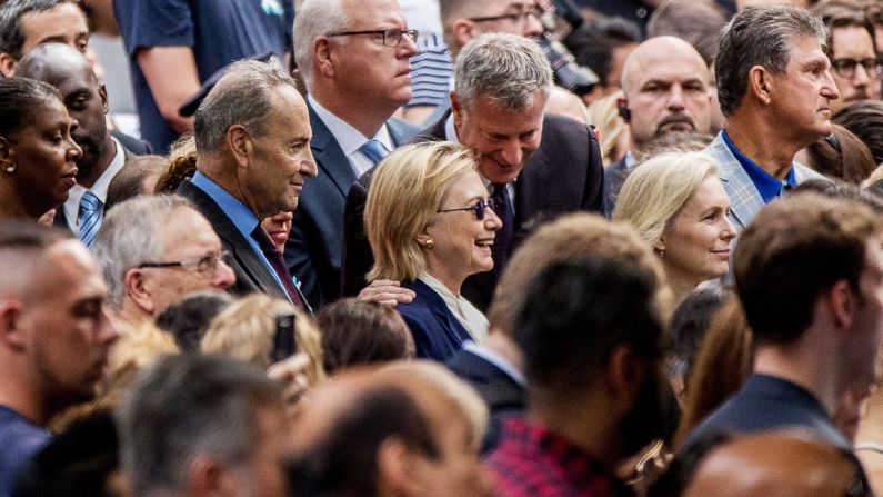 Clinton is accompanied by New York Mayor Bill de Blasio during a ceremony at the city's 9/11 memorial on September 11, 2016. Clinton, who was <a href="index.php?page=&url=http%3A%2F%2Fwww.cnn.com%2F2016%2F09%2F11%2Fpolitics%2Fhillary-clinton-health%2F" target="_blank">diagnosed with pneumonia</a> two days prior, left early after feeling ill. <a href="index.php?page=&url=http%3A%2F%2Fwww.cnn.com%2Fvideo%2Fdata%2F2.0%2Fvideo%2Fpolitics%2F2016%2F09%2F12%2Fclintons-pneumonia-jolts-race-pkg-zeleny-newday.cnn.html" target="_blank">Video appeared to show her stumbling</a> as she left the event.