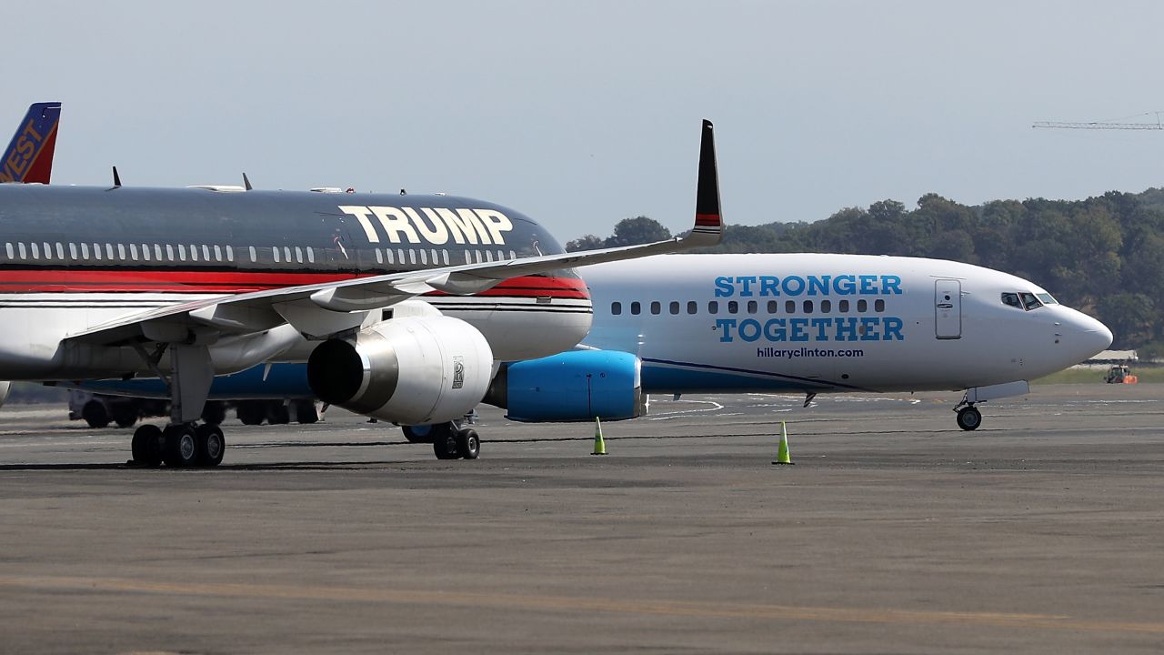 The campaign planes of Trump and Clinton sit on the tarmac at Reagan National Airport near Washington on September 16, 2016.