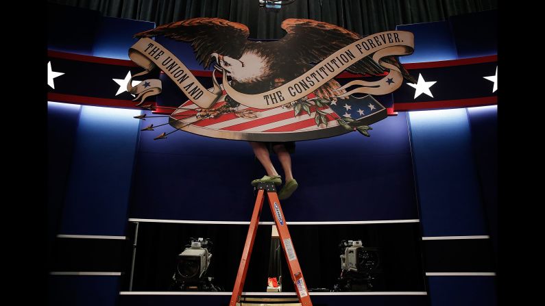 Workers prepare the stage for <a href="index.php?page=&url=http%3A%2F%2Fwww.cnn.com%2F2016%2F10%2F09%2Fpolitics%2Fgallery%2Fsecond-presidential-debate%2Findex.html" target="_blank">the second presidential debate,</a> which took place in St. Louis on October 7, 2016.