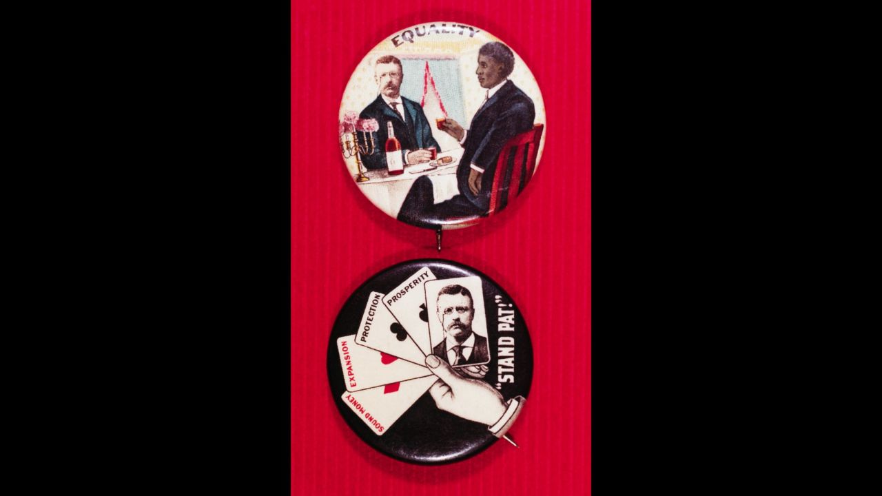 These buttons are from President Theodore Roosevelt's re-election campaign in 1904. On the top is a button for racial equality. On the bottom is a poker hand with the term "stand pat," meaning to play one's hand without drawing new cards.