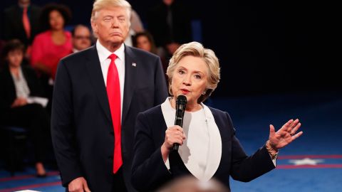 Trump <a href="http://www.cnn.com/2016/10/09/politics/donald-trump-looming-hillary-clinton-presidential-debate/" target="_blank">looms behind Clinton</a> at the second debate, which was a town-hall format with questions from undecided voters.
