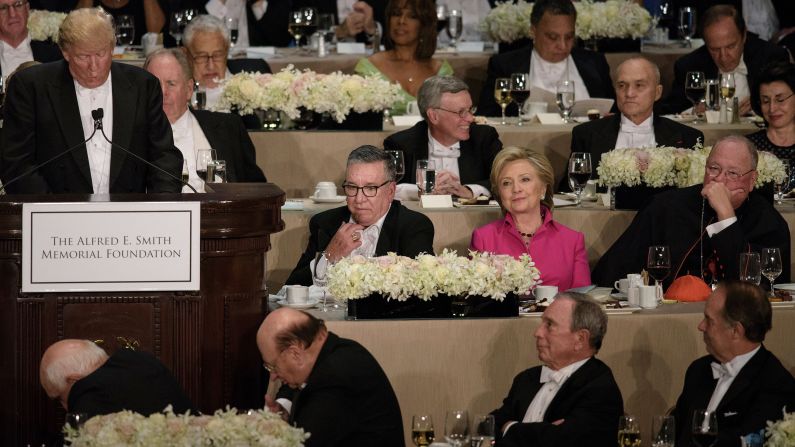 Clinton listens to Trump speak at <a href="index.php?page=&url=http%3A%2F%2Fwww.cnn.com%2F2016%2F10%2F20%2Fpolitics%2Fal-smith-dinner-hillary-clinton-donald-tump%2Findex.html" target="_blank">the Al Smith charity dinner</a> in New York on October 20, 2016. The annual event benefits Catholic charities and is often one of the final opportunities for presidential candidates to share a stage before the election. Historically, it has been a good-natured roast -- but CNN's Stephen Collinson said Clinton and Trump <a href="index.php?page=&url=http%3A%2F%2Fwww.cnn.com%2F2016%2F10%2F21%2Fpolitics%2Fal-smith-dinner-hillary-clinton-donald-trump-campaign%2Findex.html" target="_blank">struggled to disguise the anger, bitterness and sheer open dislike</a> that has pulsed through the race.
