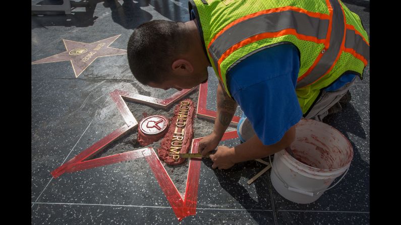 Workers repair Trump's star on the Hollywood Walk of Fame after <a href="index.php?page=&url=http%3A%2F%2Fwww.cnn.com%2F2016%2F10%2F26%2Fpolitics%2Fhollywood-star-donald-trump-vandalism%2Findex.html" target="_blank">it was vandalized</a> on October 26, 2016.