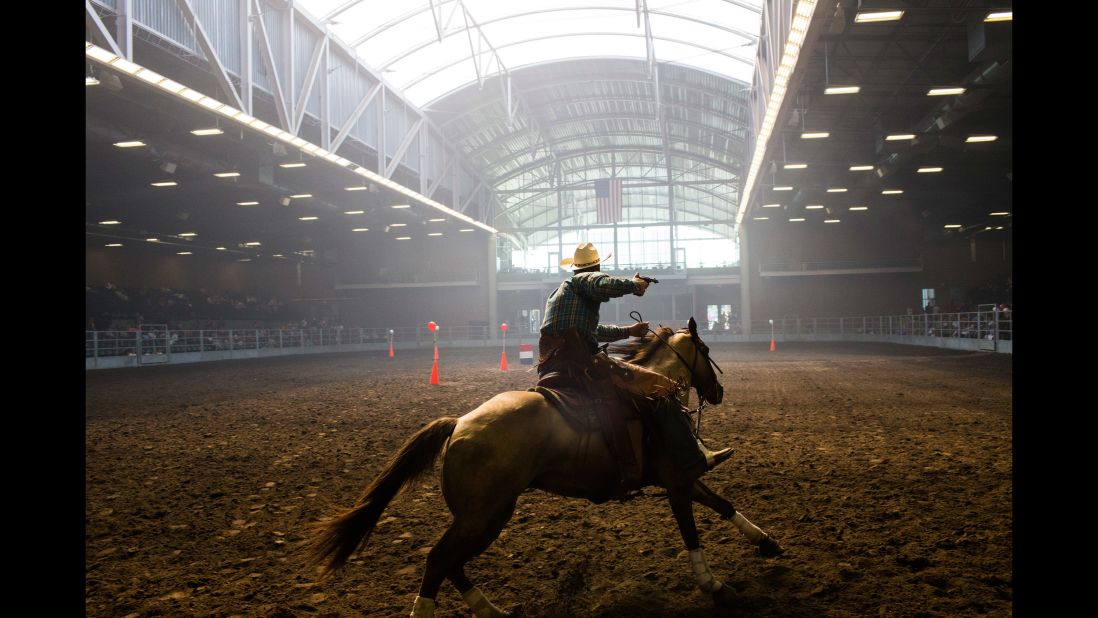 Brian Bolton, from Creston, Iowa, participates in a mounted shooting competition at the Iowa State Fair on August 14, 2015. Photographer Landon Nordeman <a href="http://www.cnn.com/2015/08/15/politics/gallery/iowa-state-fair-postcards/index.html" target="_blank">visited the fair</a> in search of presidential candidates and interesting people.
