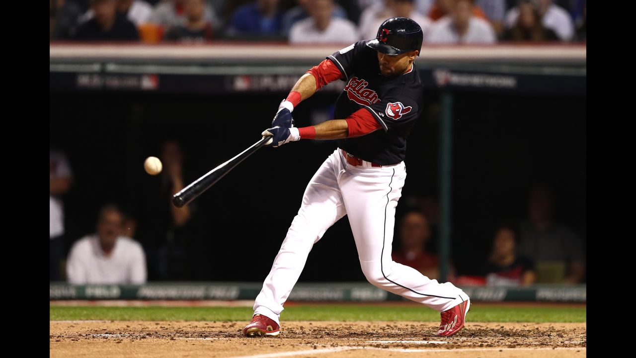 Coco Crisp of the Indians hits a double during the third inning in Game 7.
