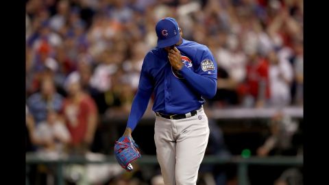 Aroldis Chapman of the Chicago Cubs reacts after Rajai Davis of the Cleveland Indians (not pictured) hit a two-run homer during the eighth inning to tie the game 6-6 in Game 7.