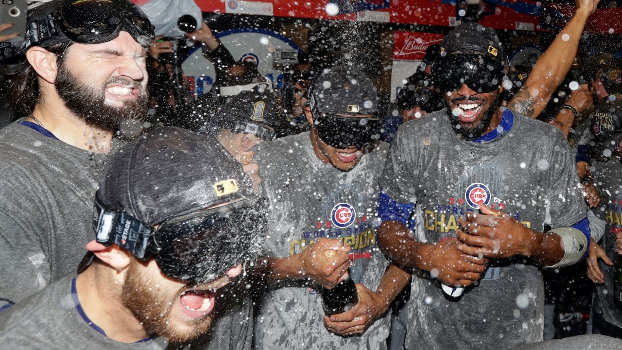 The Chicago Cubs celebrate in the locker room.