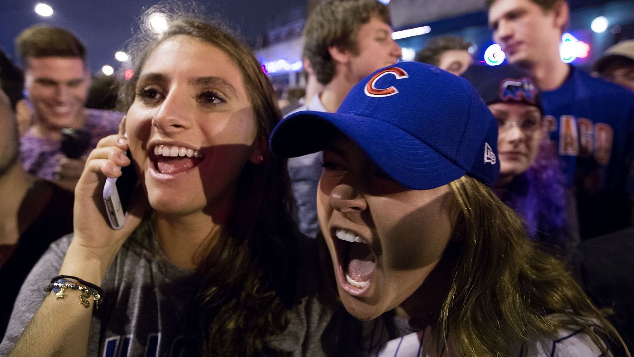 Even though the game took place 268 miles away, Chicago fans packed the bars and streets around Wrigley Field to savor the moment. 