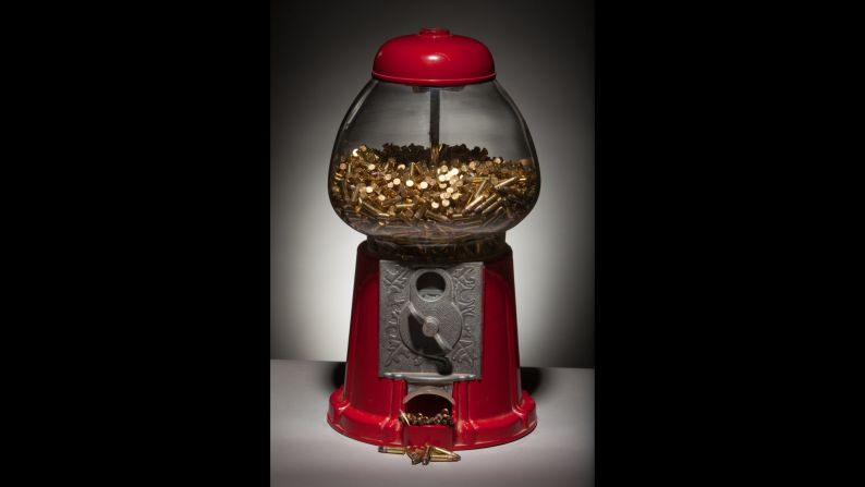 Generic Art Solutions, the team of Matt Vis and Tony Campbell, created this sculpture using a vintage gumball machine and 2,000 .22 hollow-point bullets. This art duo uses art to examine recurring themes of human drama including violence.  