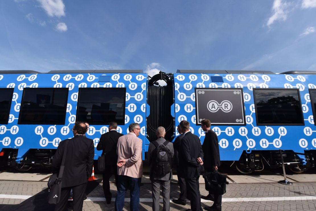 Visitors check out the Coradia iLint train after it was unveiled at Innotrans, the railway industry's largest trade fair, in Berlin on September 20, 2016.
