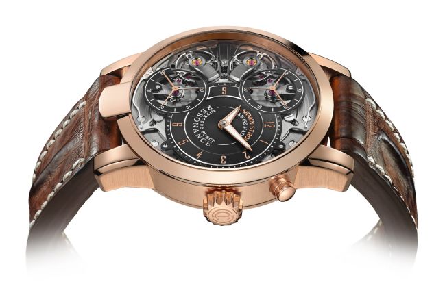 <a  target="_blank" target="_blank">Armin Strom's</a> Mirrored Force Resonance contains two distinct movements for ultimate precision -- mechanisms proudly displayed through the dial. Its complimented with an alligator strap and rose gold hardware. 