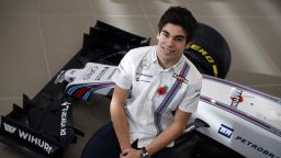 Canadian driver Lance Stroll poses for a photograph following the announcement by Williams Martini Racing of their driver line up for the 2017 FIA Formula One World Championship at the team headquarters in Grove, west of London on November 3, 2016.
Canadian teenager Lance Stroll will replace veteran Felipe Massa in Williams's driver line-up for the 2017 season, the British team announced on Thursday. Stroll, who turned 18 last week, will line up alongside Finnish driver Valtteri Bottas, who will be entering his fifth successive year with Williams.
 / AFP / Adrian DENNIS        (Photo credit should read ADRIAN DENNIS/AFP/Getty Images)