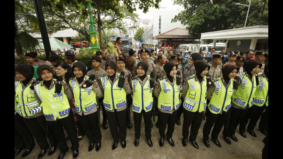 Indonesian policewomen stood guard during the protest outside Jakarta's City Hall on November 4.