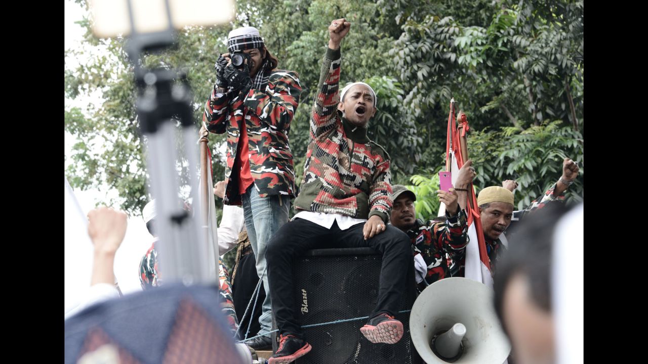 Protesters sat atop a speaker system during the demonstration on November 4.