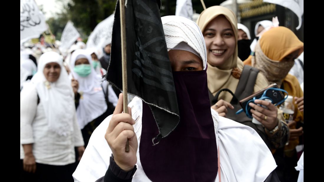 Female Muslim protesters marched outside the governor's office on November 4.